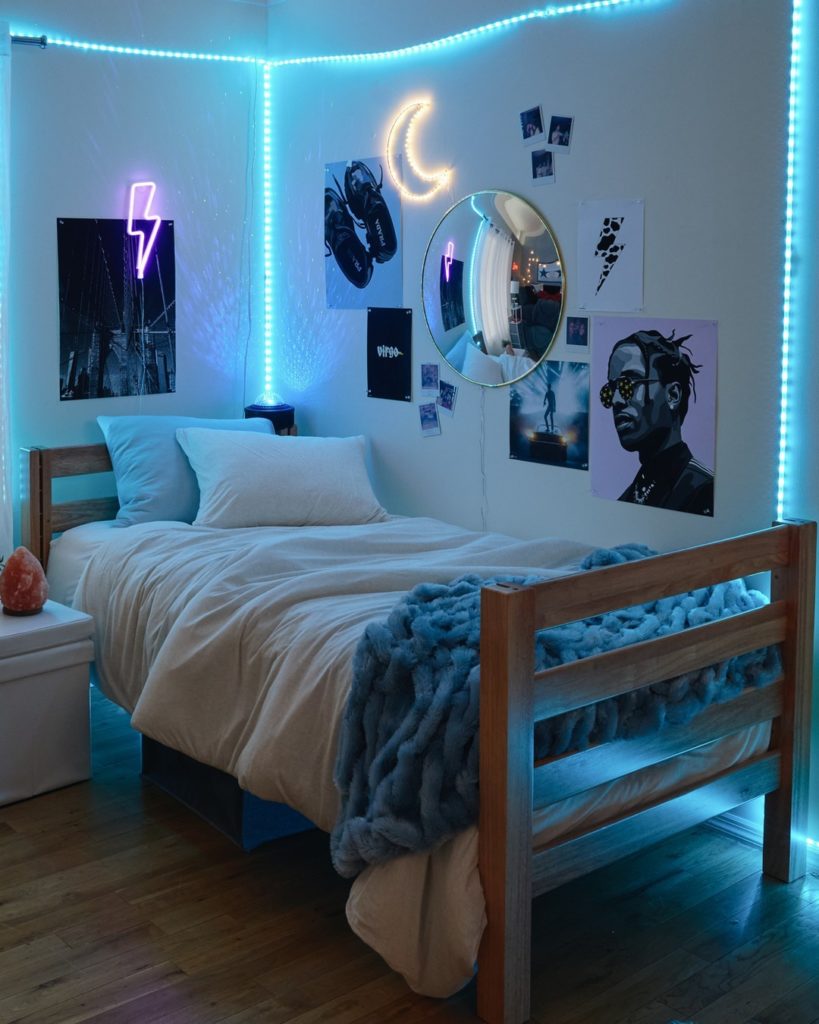 Euphoria asethetic room with blue strip lights and purple neon signs