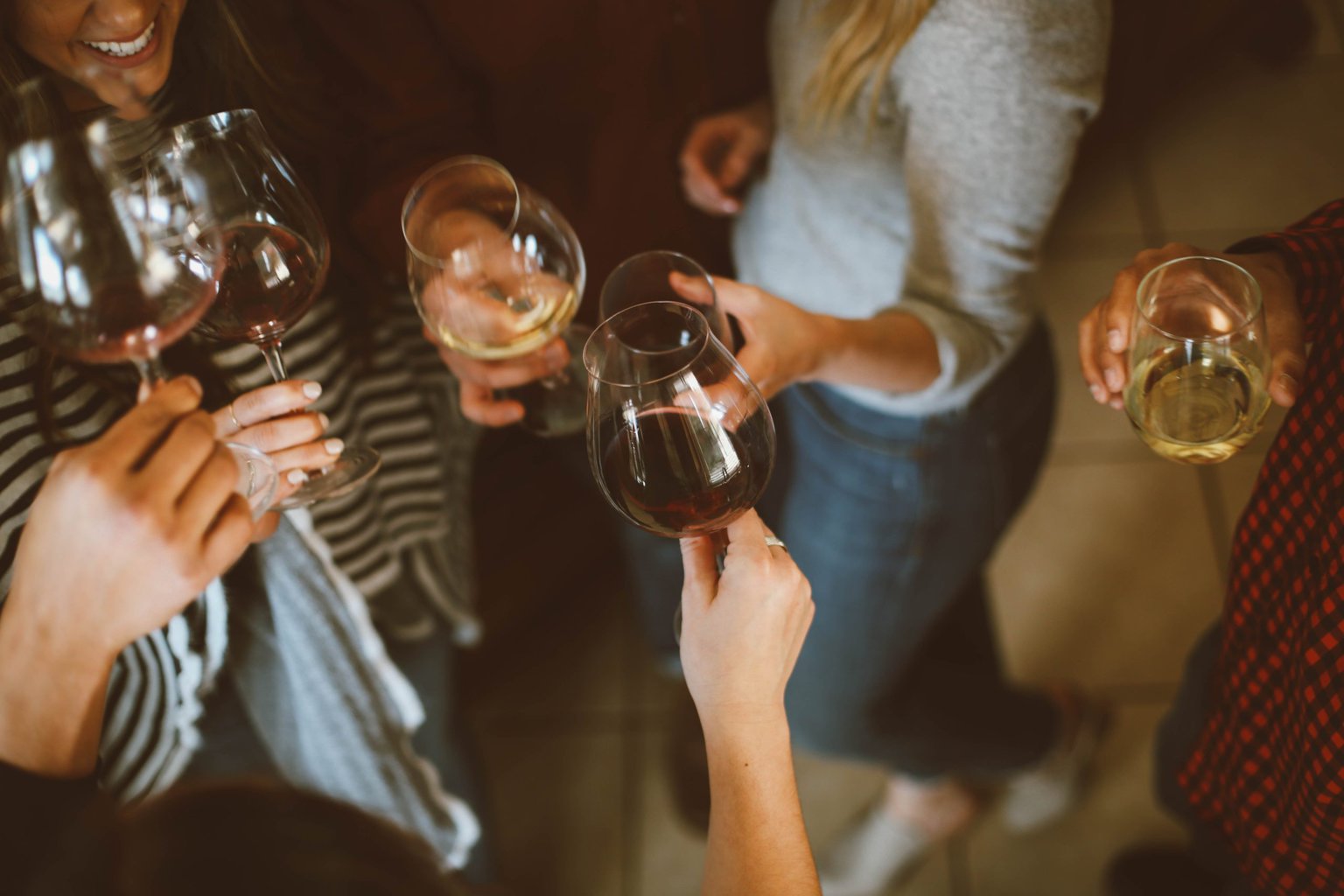 Wine tasting photo from unsplash - fancy dinner party